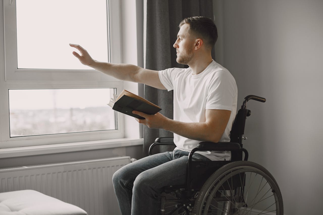 A Man Holding a Book